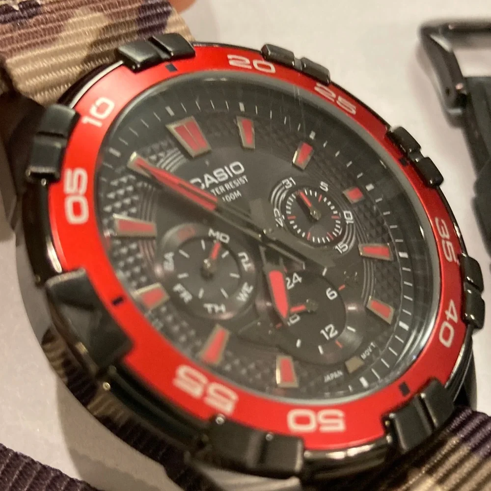 Casio MTD1069 watch, red and black with camo strap & rubber strap, working batty